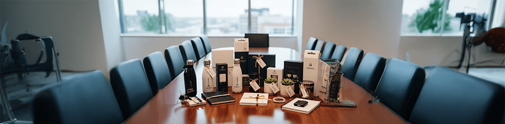 The Ultimate Guide to Corporate Gifts for Employees: Boost Morale and Show Appreciation with different 4 Gift Items 2 Corporate Gifts on the table for Employees in Oman
